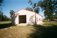 30x40x10, 20\' extended roof line, lightstone walls rustic red trim