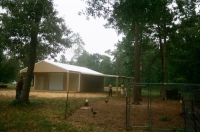 30x30x10, 10' extended roof line 20' lean-to. Saddle tan walls, white roof and trim.